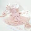Trusou pentru botez cu rochita roz pudrat personalizata si lumanare botez